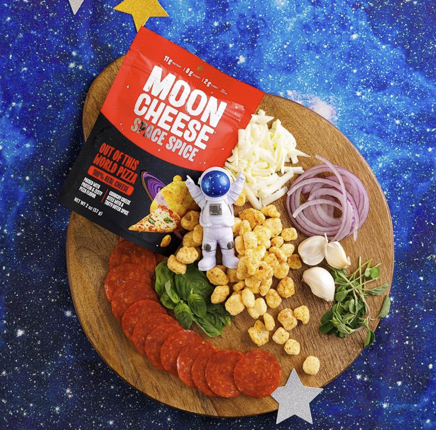 Moon Cheese Space Spice pizza flavor packaging on wooden charcuterie board